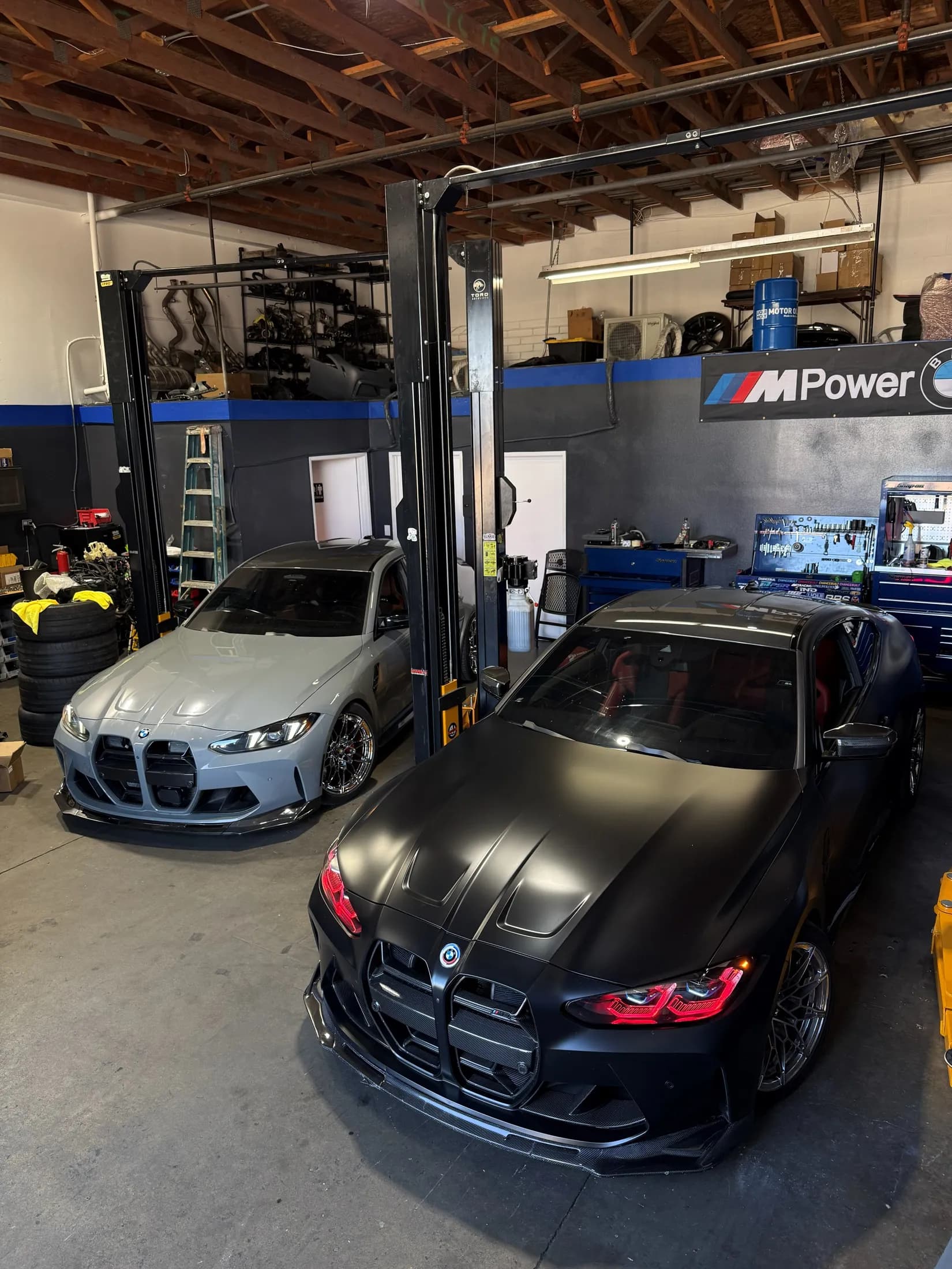 Cars on the lifts at ChanceBuilt Performance